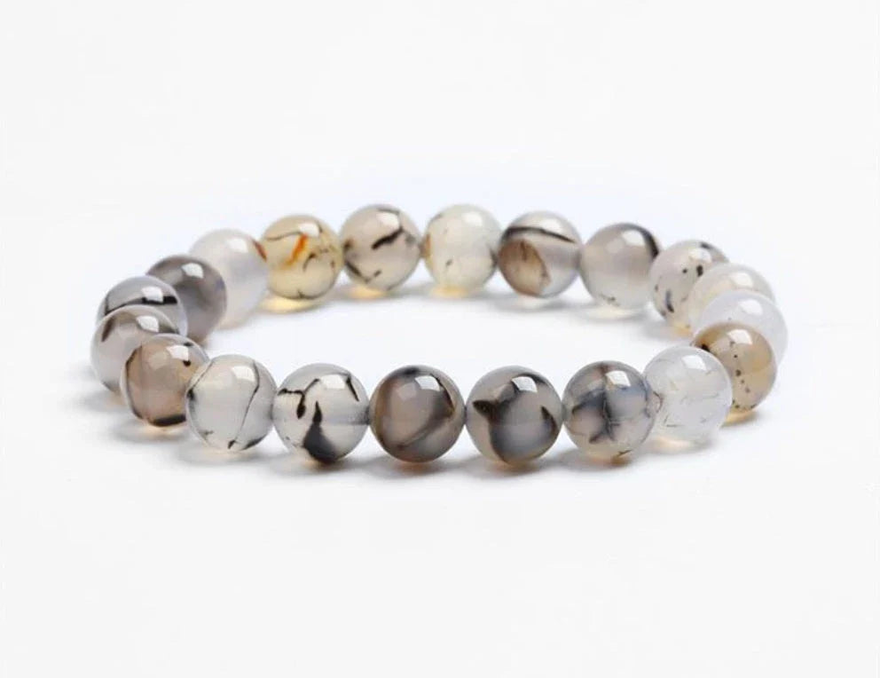 Handcrafted black lava beaded bracelet with seven chakra stones for healing and balance