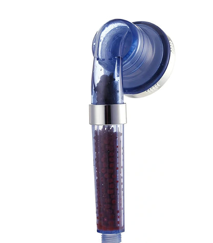 Pressurised shower head with stainless steel panel showing three water mode settings and removable nozzles