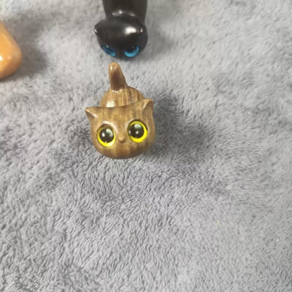 Handmade green sandalwood kitten ornament with unique design