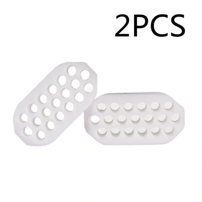 Compact black silicone jaw trainer for muscle shaping, food-grade material, portable at 5cm size for daily facial exercises