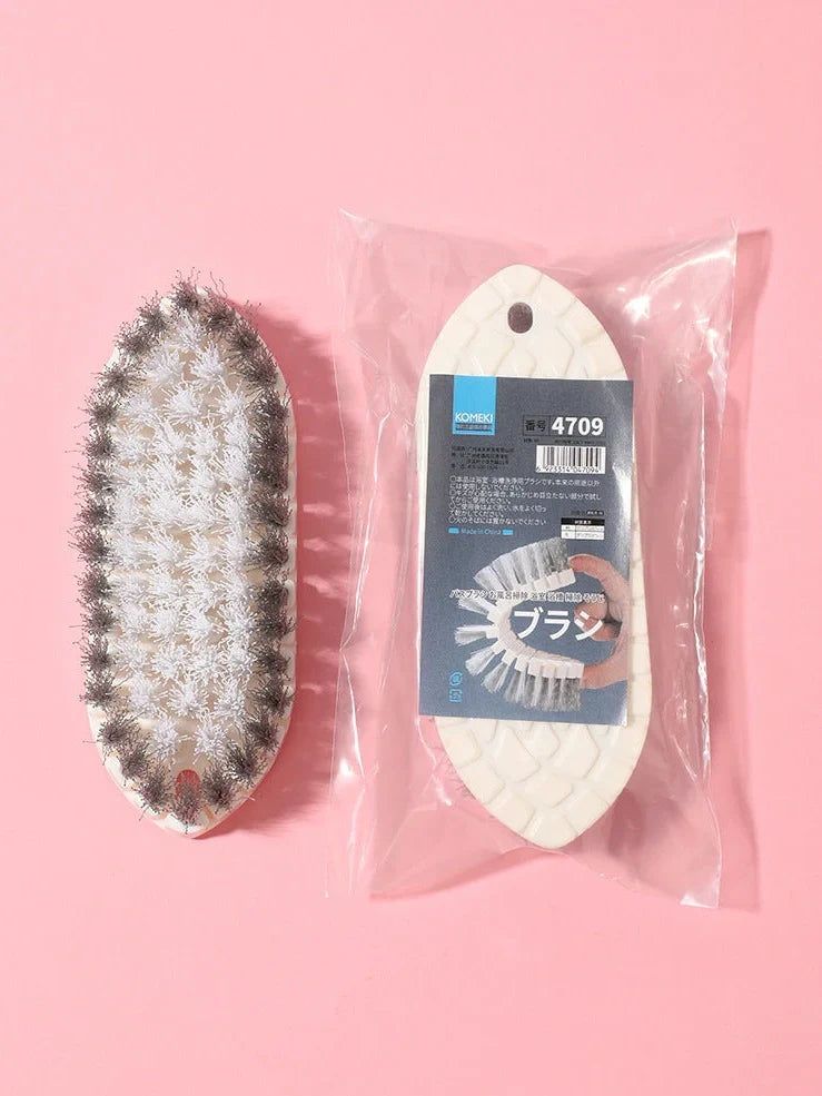 White flexible plastic bathroom tile cleaning brush measuring 15.5cm long