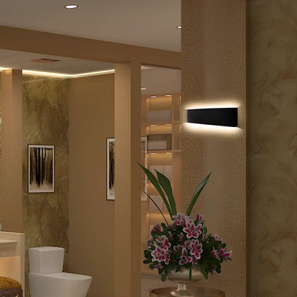 Slim 310mm wall light with aluminium alloy construction and 3000K warm LED illumination