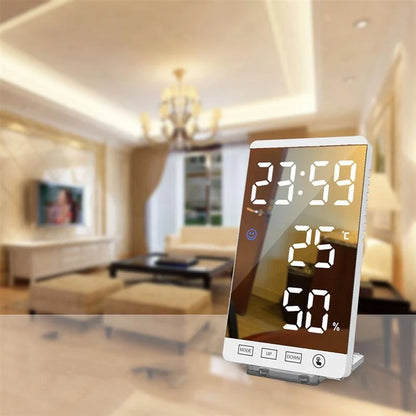 Multifunctional LED mirror alarm clock displaying time, temperature, and humidity