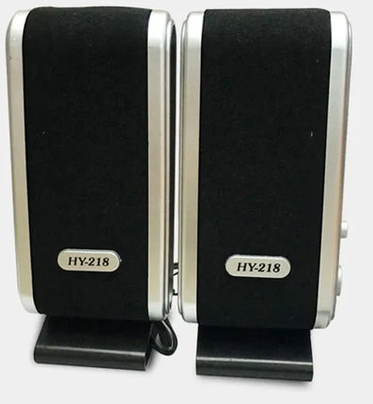 Black compact USB notebook mini speaker for laptop and computer audio enhancement.