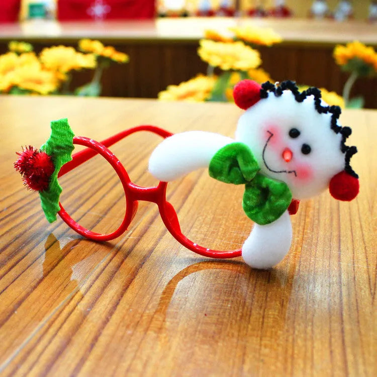 Assorted Christmas novelty glasses with Santa, snowman, antler and rabbit ear designs