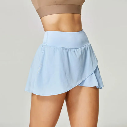 Women's solid colour quick-drying sports shorts in nylon and spandex for running and gym.