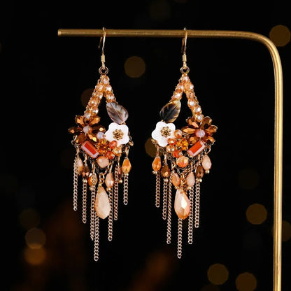 Hand-woven bohemian long earrings with artificial crystal detailing in red and black, champagne, or amethyst colours