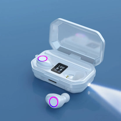 Black and white wireless Bluetooth in-ear headphones with a charging cabin showing an LED power display.