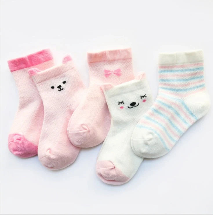 Vibrant 5-pack cotton kids' socks for boys and girls, perfect for summer comfort and style.