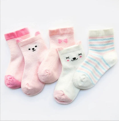 Vibrant 5-pack cotton kids' socks for boys and girls, perfect for summer comfort and style.