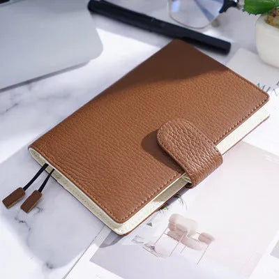 Cowhide leather A6 notebook with Lychee pattern design in loose-leaf diary format