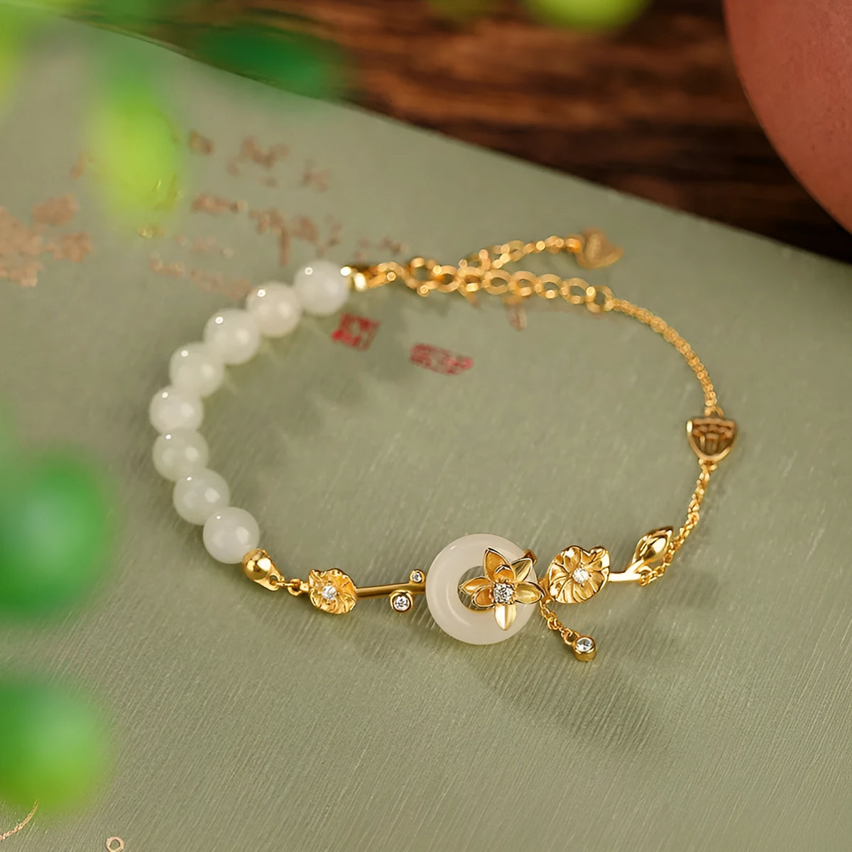 Hetian jade lotus peace buckle bracelet in 925 silver with gold plating, antique retro style