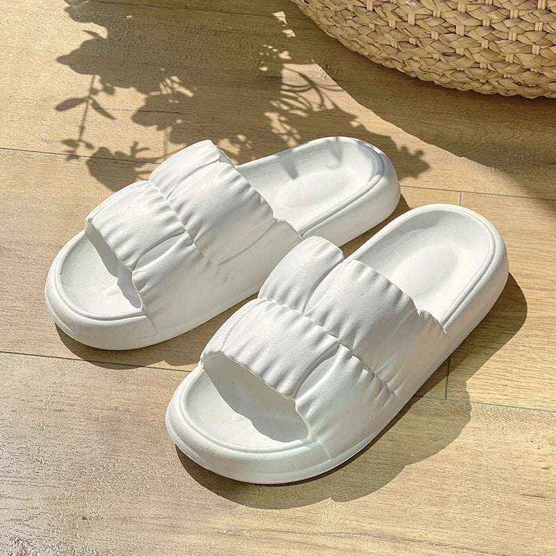 Comfortable and stylish women's bathroom slides in various vibrant colors and patterns