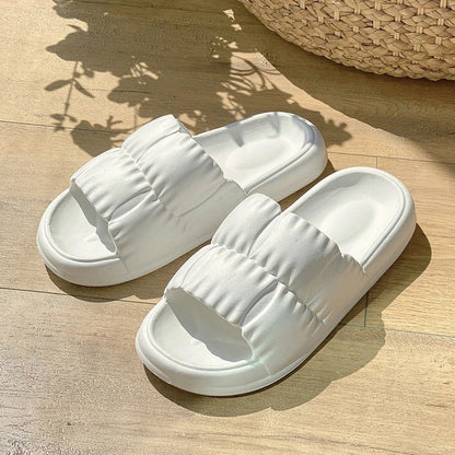 Comfortable and stylish women's bathroom slides in various vibrant colors and patterns