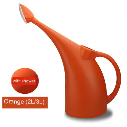 Green watering can with long spout showing measurements and shower head attachment for garden plants