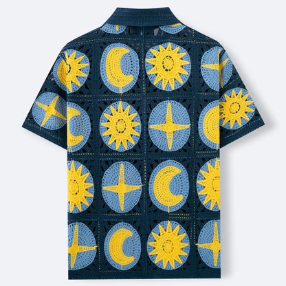 Navy blue men's short-sleeve cardigan with a cartoon flocking design on the front.