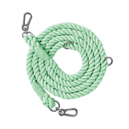 Woven rainbow pattern dog leash with double grip handles and a metal clasp.