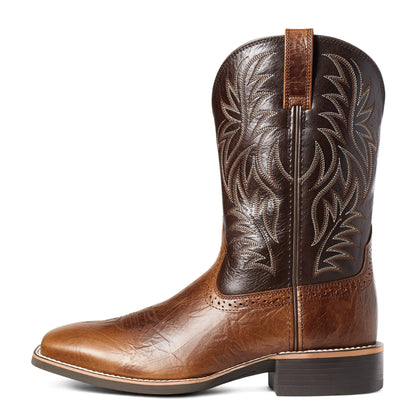 Black Western cowboy boot with vintage embroidery, square toe, and low heel on a rubber sole
