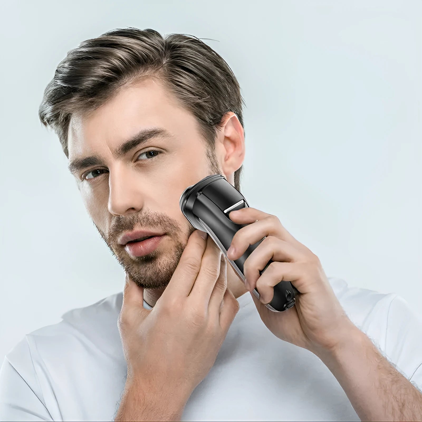 Men's electric shaver with three floating heads, pop-up sideburn trimmer, and USB charging cable.