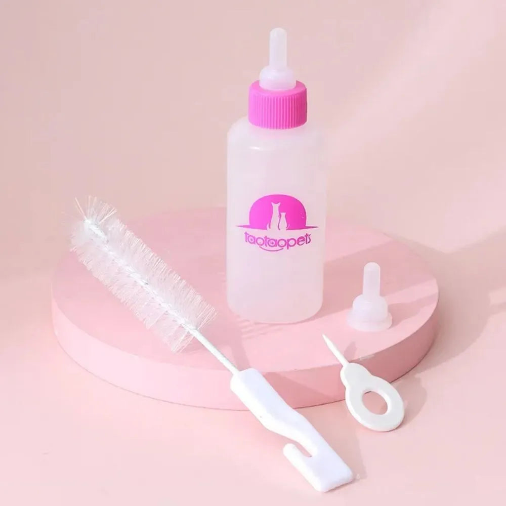 Four pet milk bottles in blue, green, pink and yellow colours with cleaning brush for small animal feeding