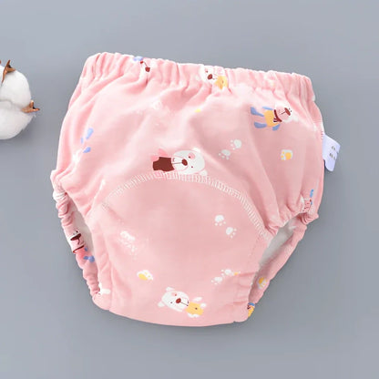 Washable baby training pants with 6-layer gauze construction in assorted patterns including animals and geometric designs
