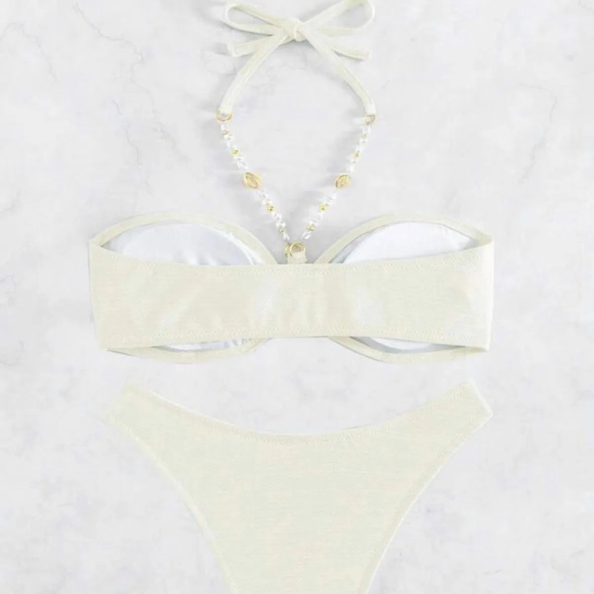 Women's halter neck bikini set in solid colour polyester fabric for swimming