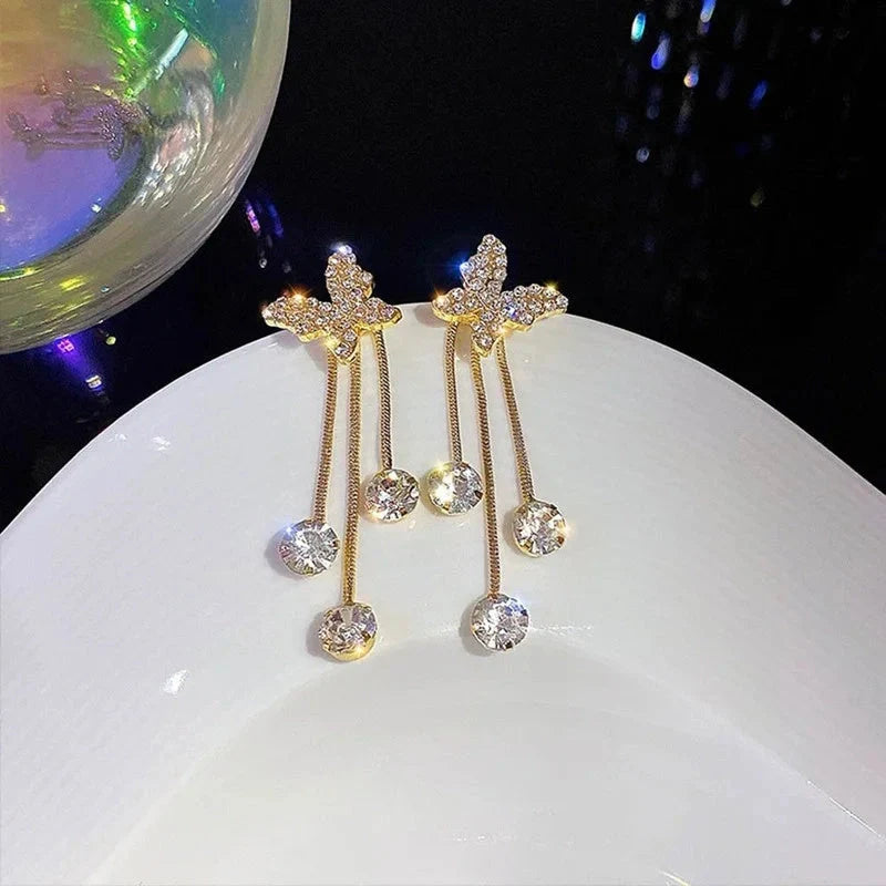 Butterfly rhinestone drop earrings with pearl tassel chain for women