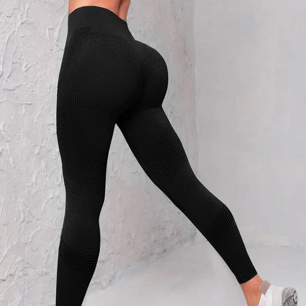 Women's high-waist seamless leggings in a variety of vibrant colors, featuring a curve-flattering design and breathable nylon fabric