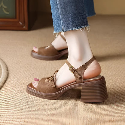 Beige women's open-toe square toe platform sandals with a retro design on a white background.