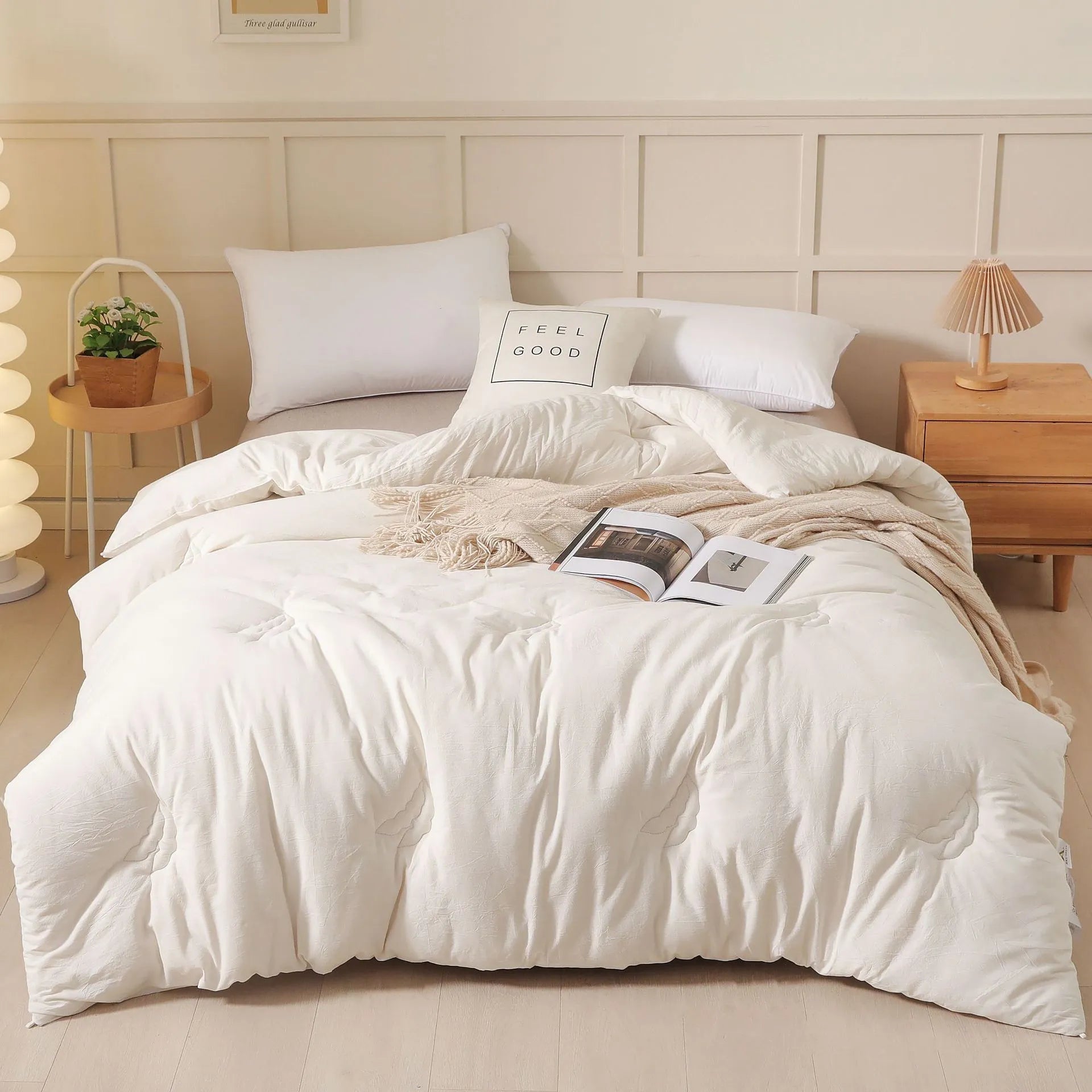 A pure cotton soybean fibre quilt in grey, showing its twill weave texture, laid flat on a bed.