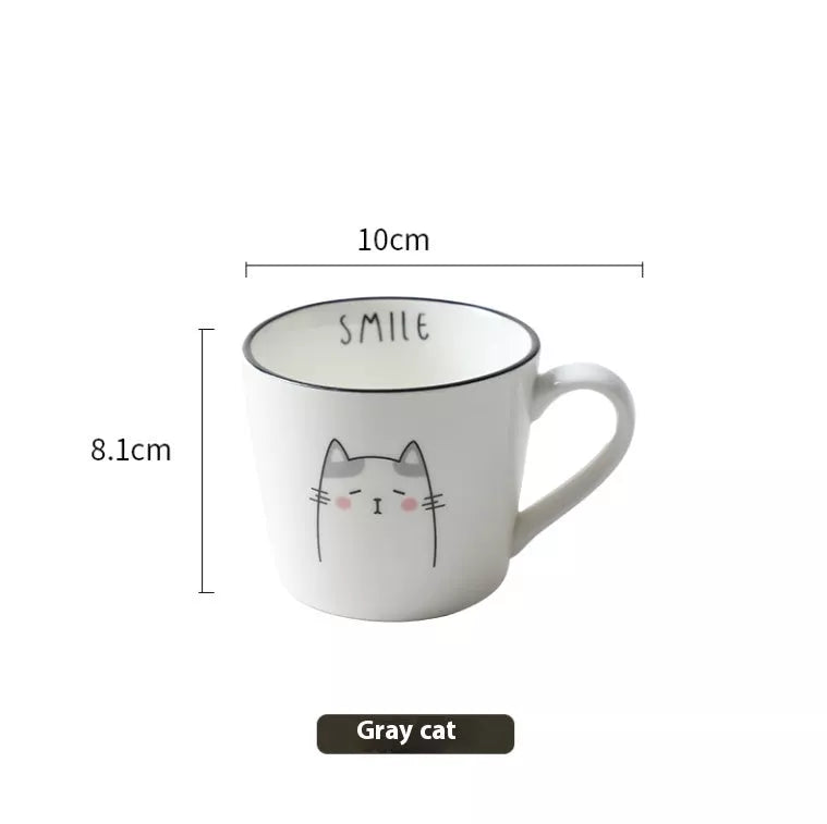 Ceramic coffee cup with cartoon cat design, perfect for couples and coffee enthusiasts