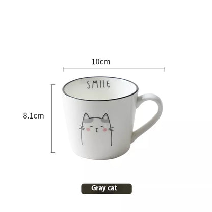 Ceramic coffee cup with cartoon cat design, perfect for couples and coffee enthusiasts