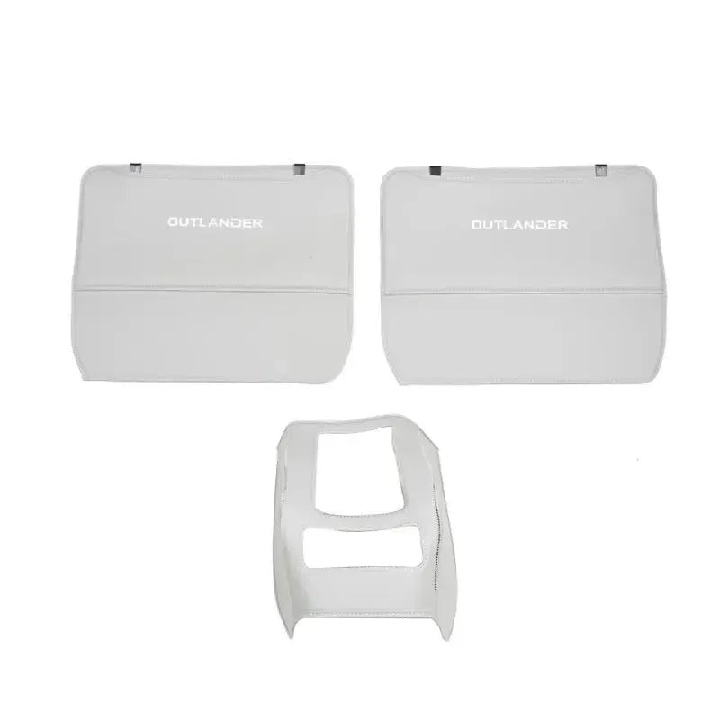 Set of three leather anti-kick protection pads for a Mitsubishi Outlander car interior.
