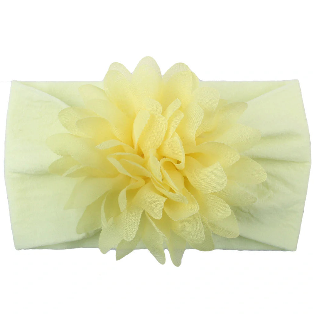 Adorable chiffon flower baby headband for your little princess, available in multiple colors.