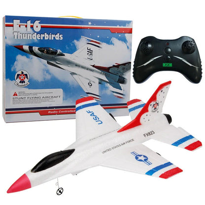 Blue fixed-wing educational toy aeroplane with 390mm length demonstrating flight with remote control