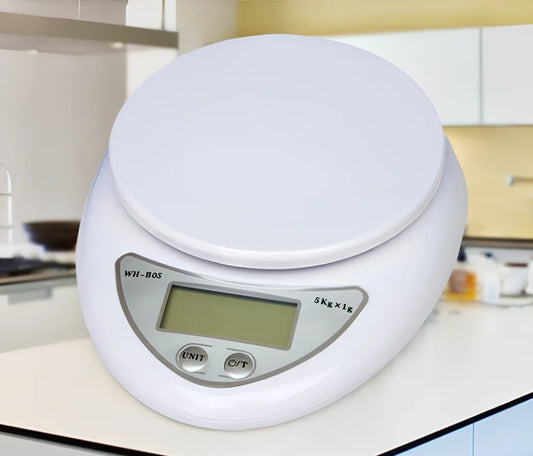 White electronic kitchen scale with digital display showing 1g precision and 5kg capacity measurements