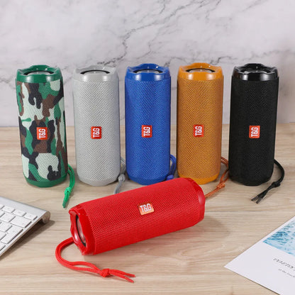 Fabric portable Bluetooth speaker with card holder in blue colour showing compact 182×73.5×69.2mm dimensions