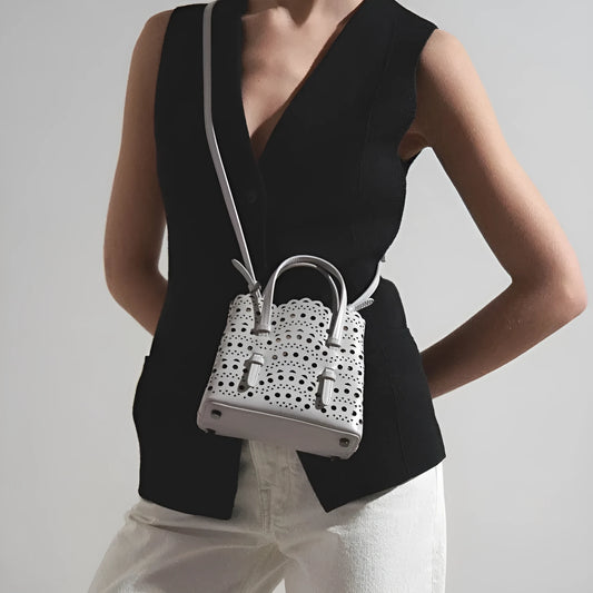 Hollow carved PU messenger tote bag with three straps in horizontal square shape