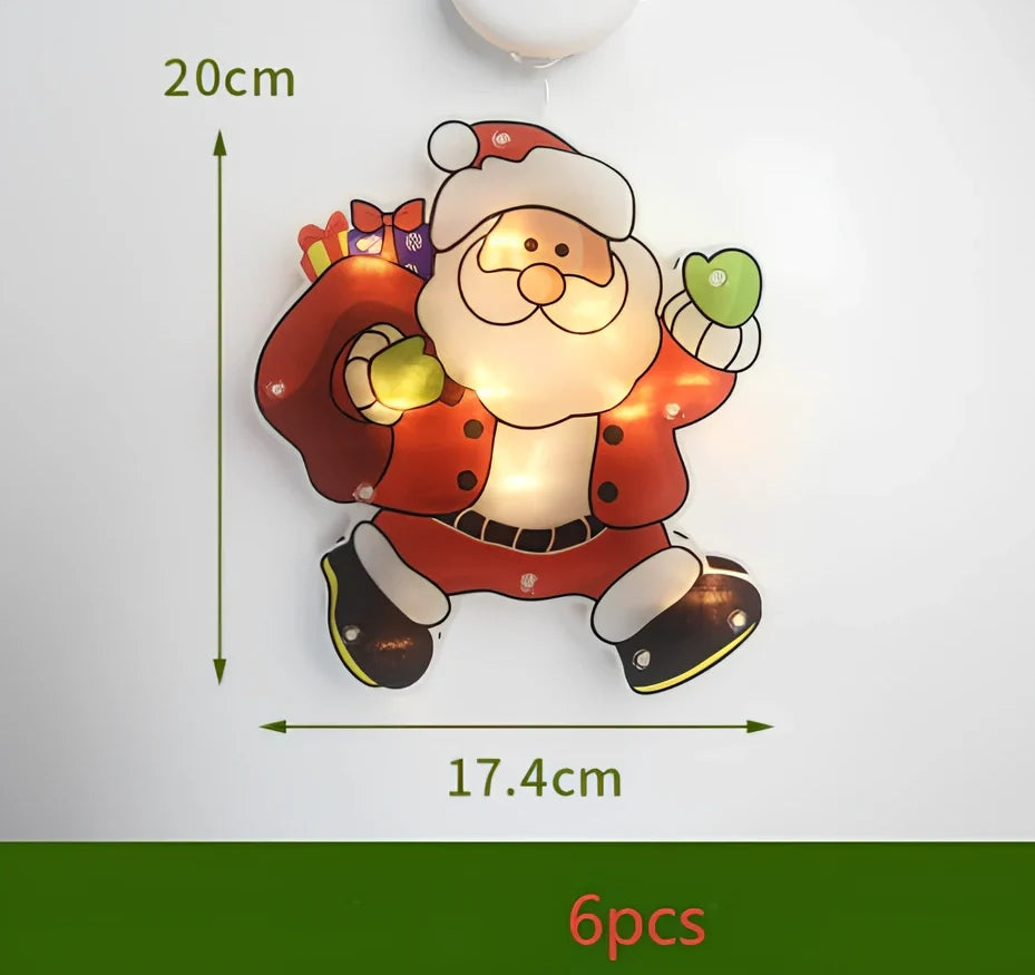 LED Christmas hanging lights with suction cups showing snowman design illuminated on window