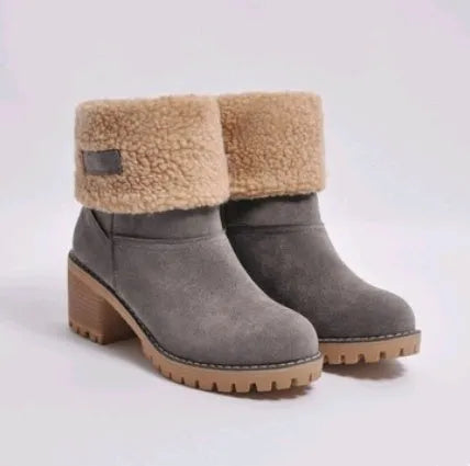 Mid-tube thick heel suede snow boots in black with beef tendon sole and waterproof platform.