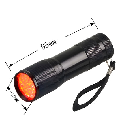 Black aluminium Smart Vein Locator handheld device with red LED light on, showing compact size.
