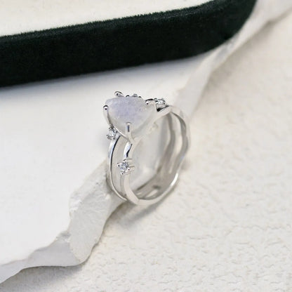 S925 sterling silver irregular triangle moonstone ring showing geometric design and 12mm gemstone centrepiece