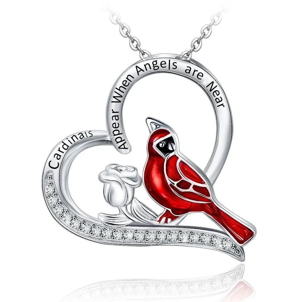 Elegant heart-shaped cardinal pendant necklace perfect for anniversaries and Valentine's Day gifts.