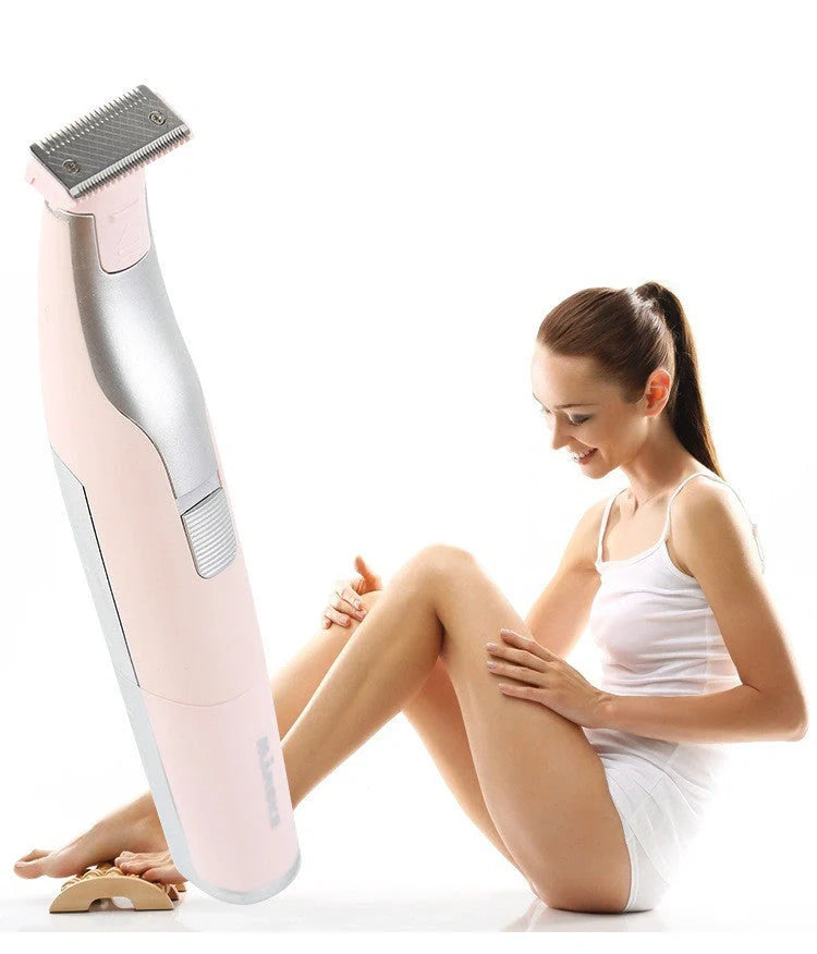 Portable hair shaver for women and men in pink and green with X3 limit comb