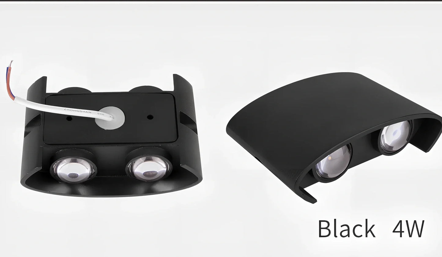 Waterproof black aluminium LED wall lamp 4W warm white emitting 60-degree beam angle mounted on white wall