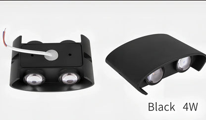 Waterproof black aluminium LED wall lamp 4W warm white emitting 60-degree beam angle mounted on white wall