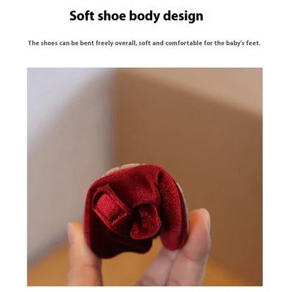 Wine red baby girl's shoes with elastic band closure and textured non-slip rubber soles