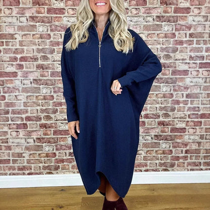Women's solid colour loose fit knitted dress with raglan sleeves and a front zipper.