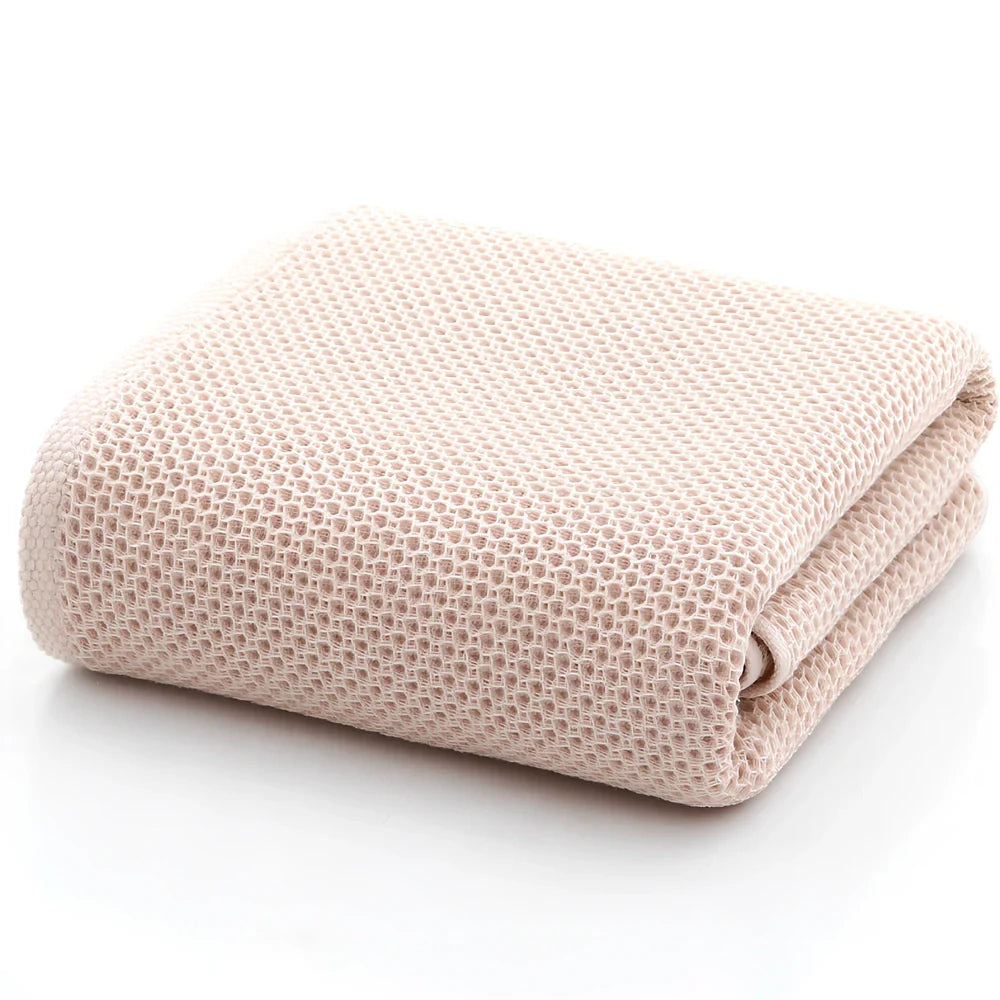 100% cotton honeycomb weave face towel in blue colour showing textured pattern and 70x140cm dimensions