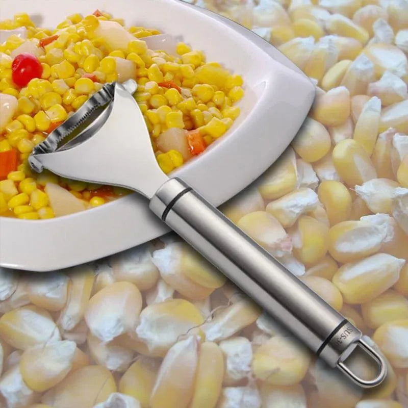 Stainless steel corn planer for removing kernels from corn on the cob.